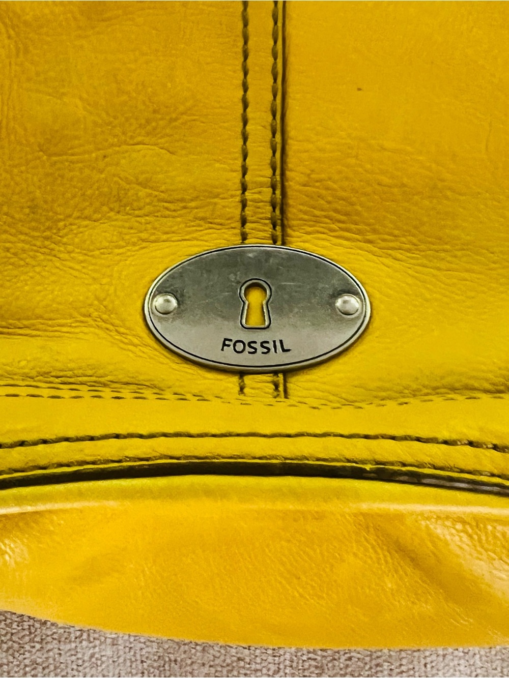 Fossil Yellow Leather Crossbody Purse features silver-tone key logo plaque - Picture 5 of 7